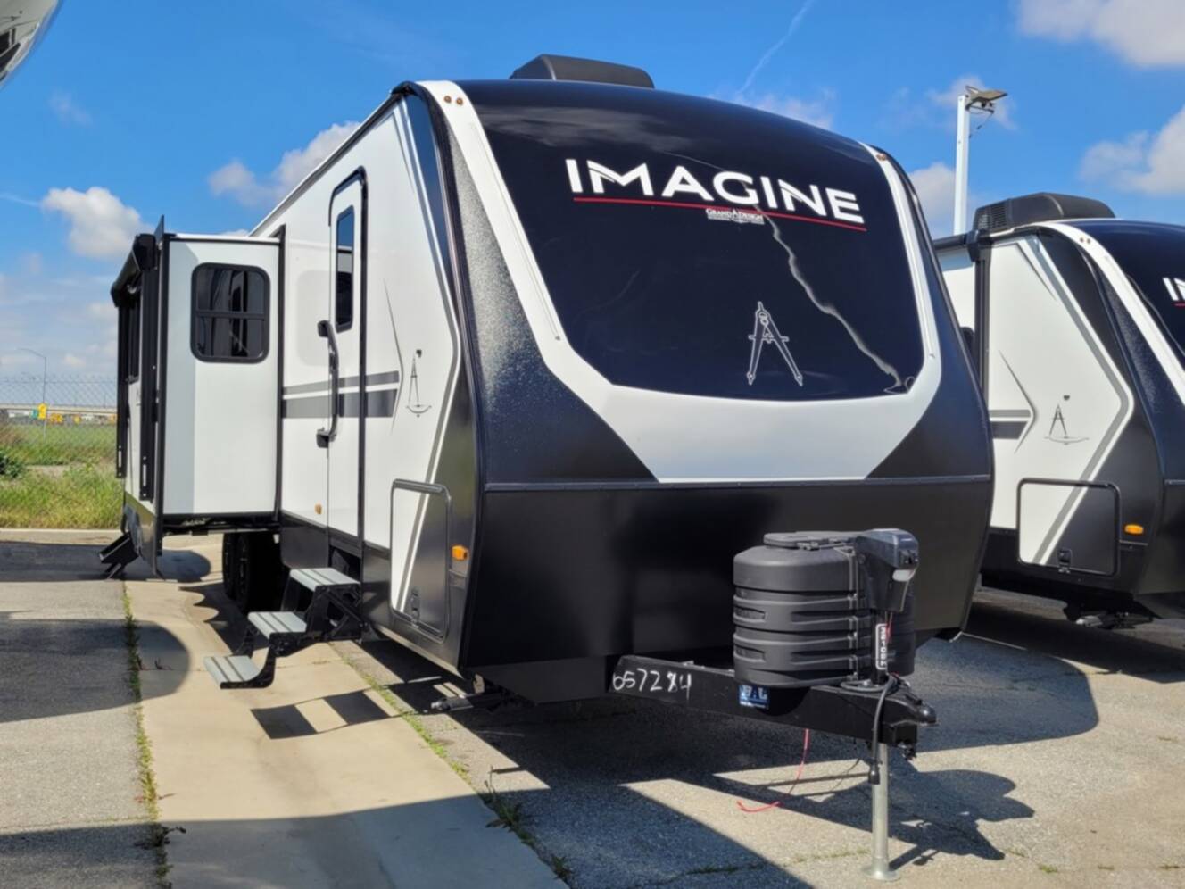 A photo of this 2026 Grand Design Imagine 3210BH