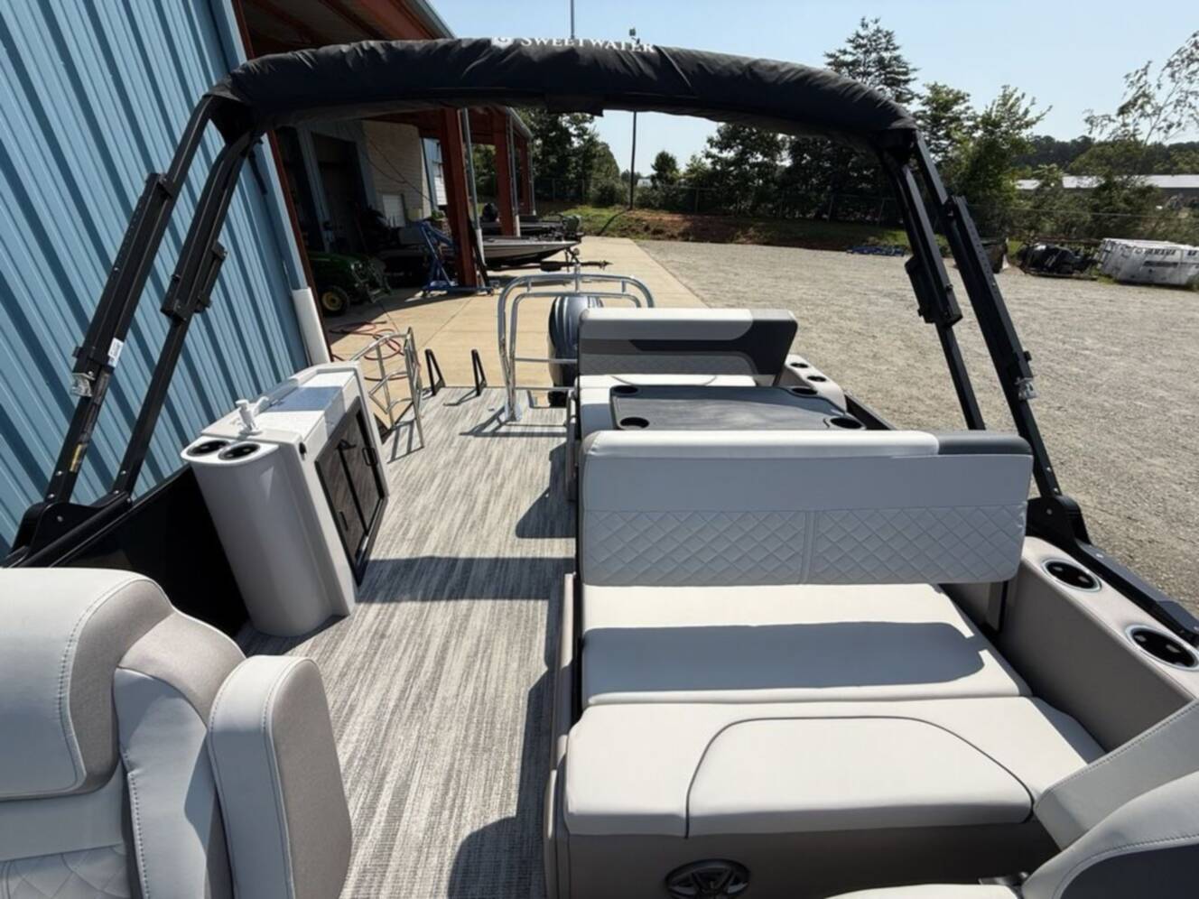 A photo of this 2025 Godfrey Pontoons Sweetwater 2486 DT 27 iMPACT Package (27 in. Center Tub