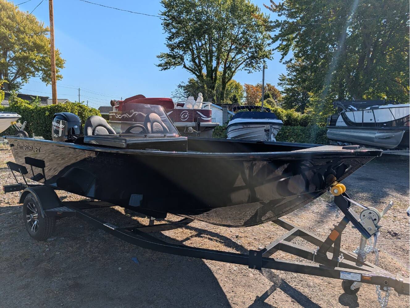 A photo of this 2026 Starcraft Marine Starfire 166 SC Midnight Edition
