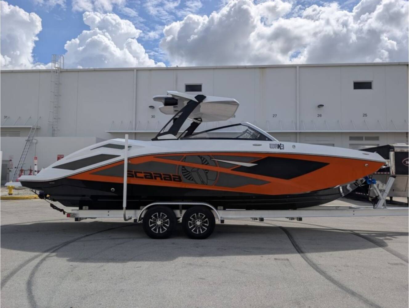 A photo of this 2026 Scarab SB285 LX WAKE