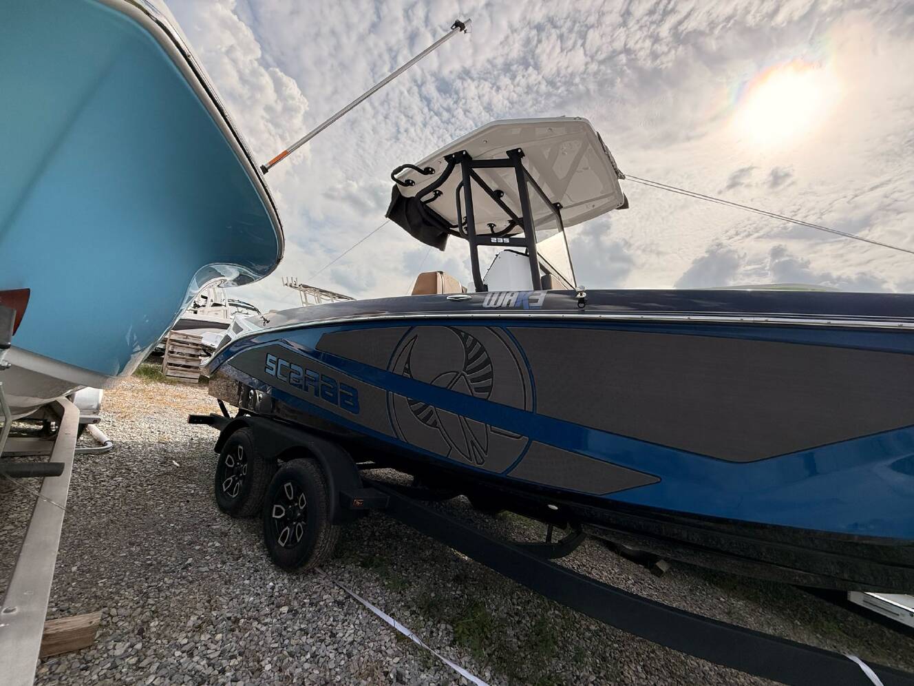 A photo of this 2025 Scarab 235 Open LX Wake