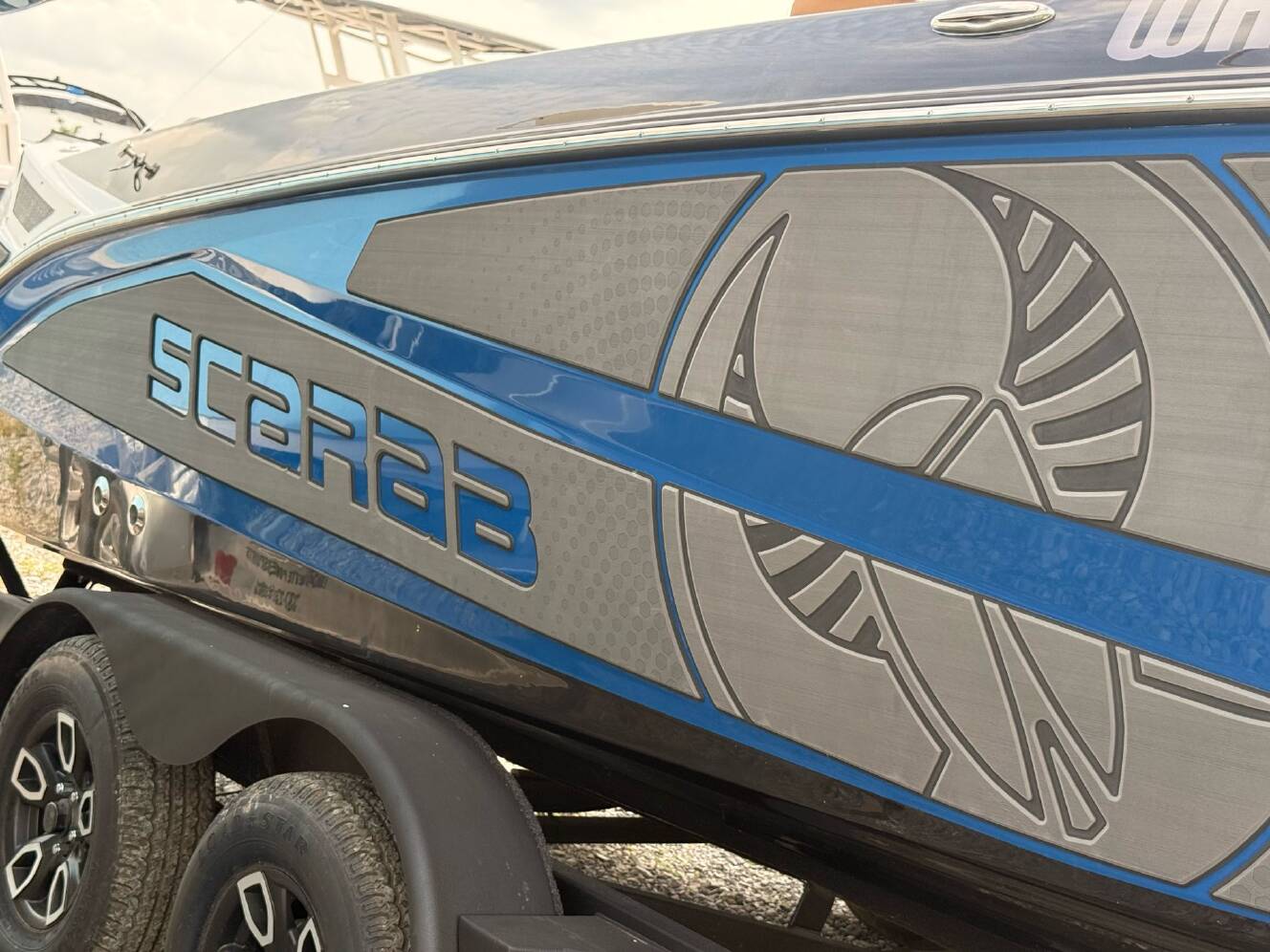 A photo of this 2025 Scarab 235 Open LX Wake