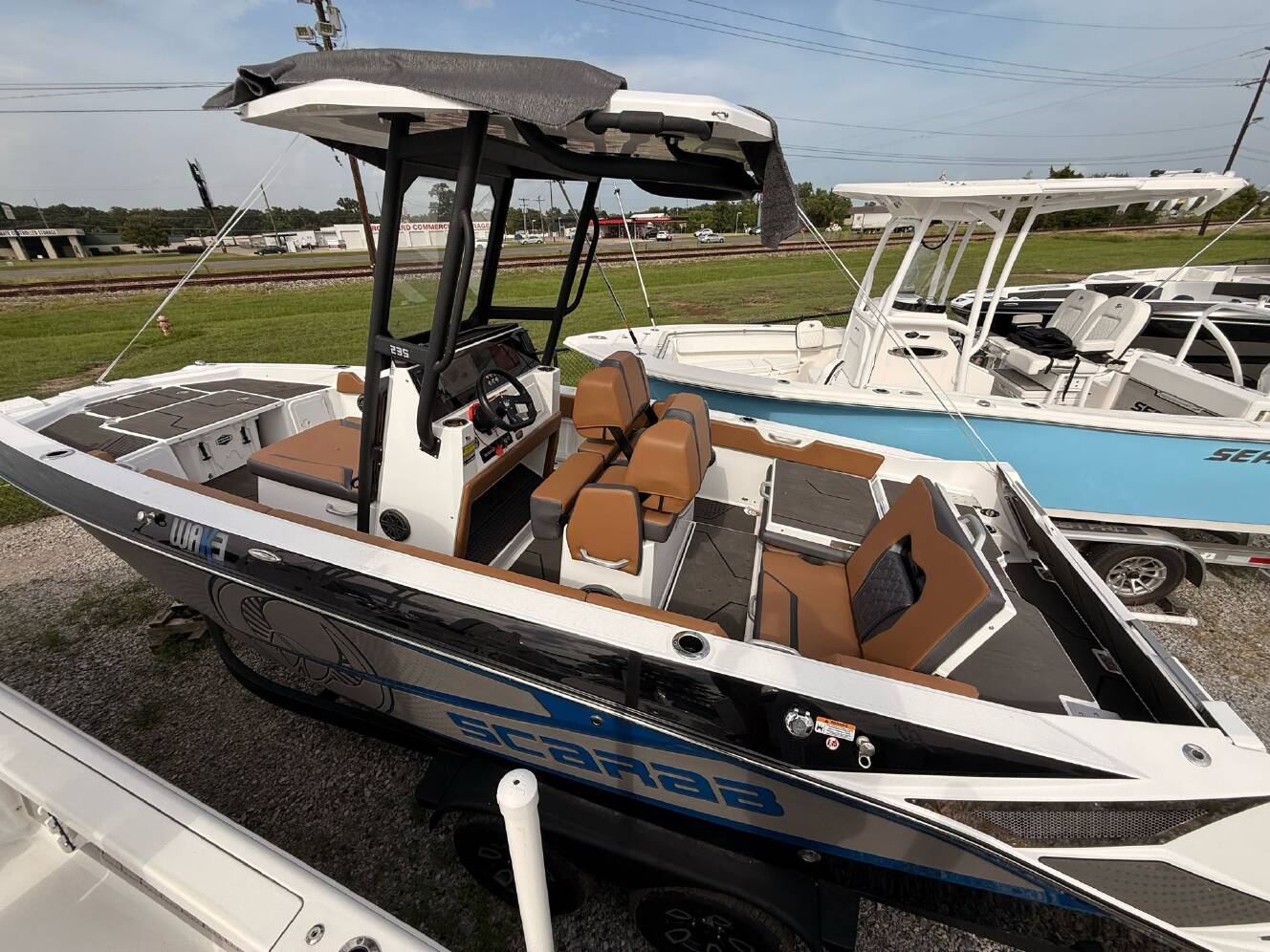 A photo of this 2025 Scarab 235 Open LX Wake