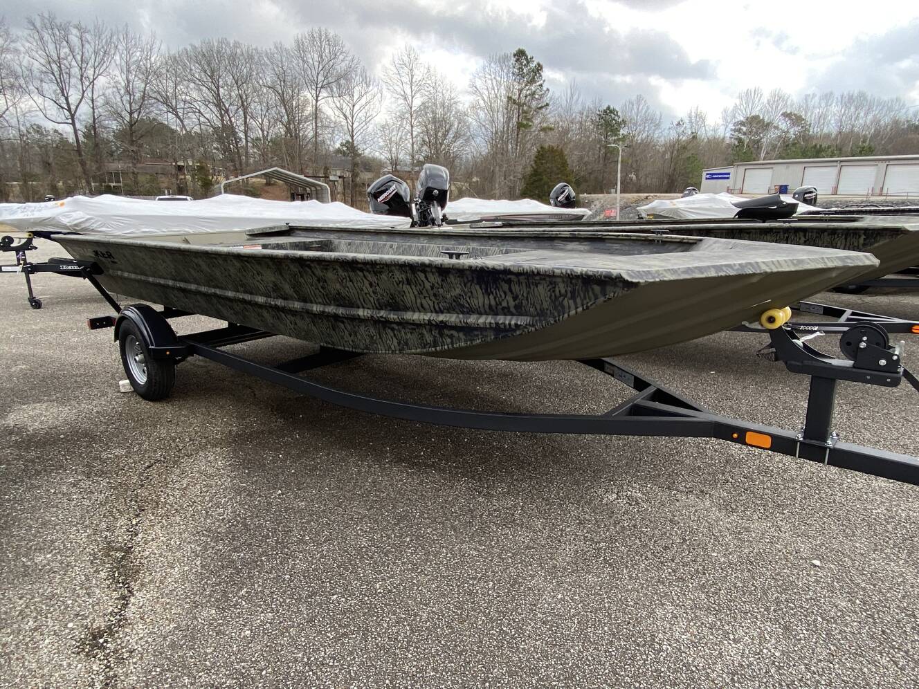 A photo of this 2026 Tracker Boats Grizzly® 1860 Utility