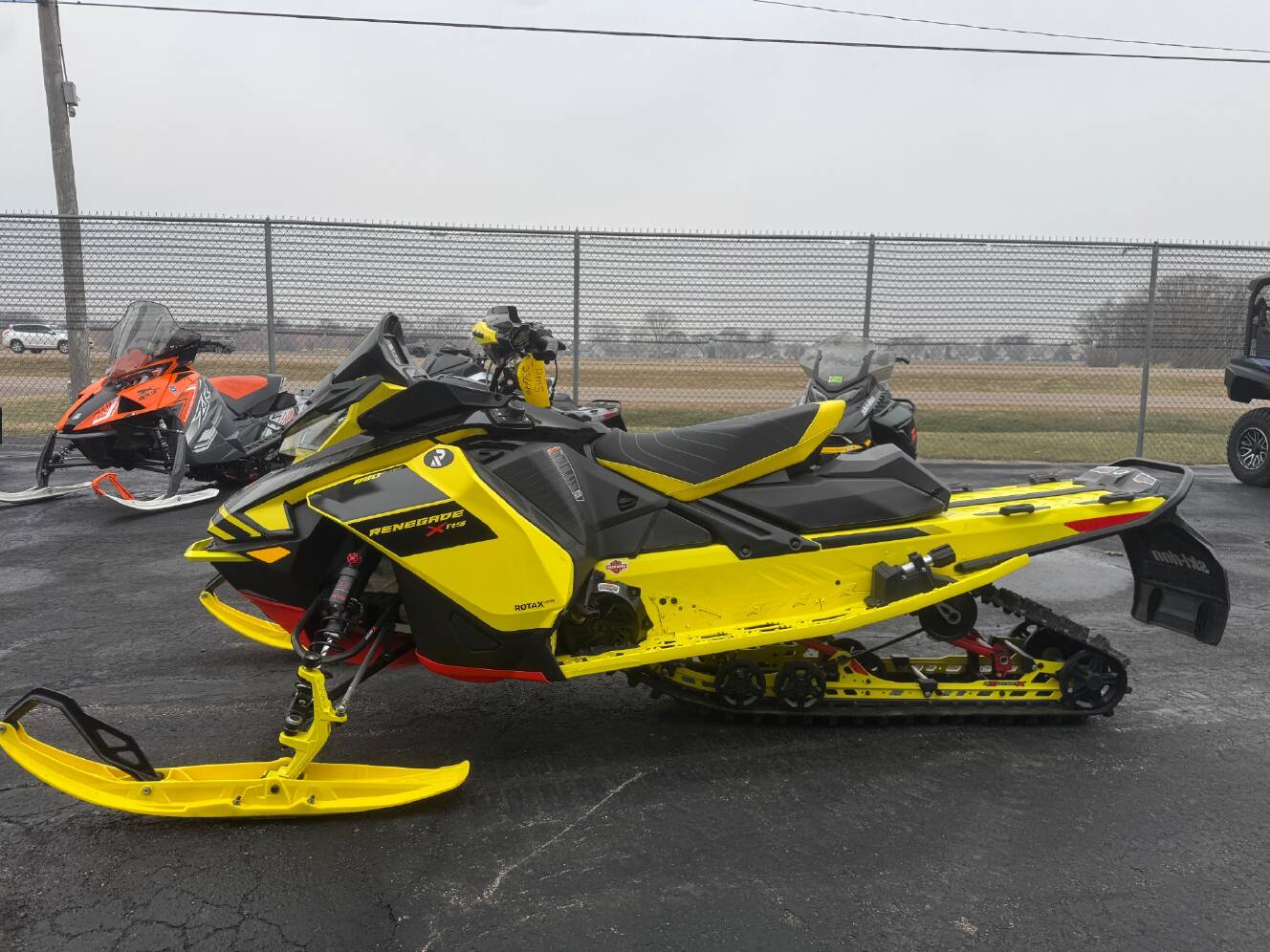 A photo of this 2021 Ski-Doo Renegade X-RS 850 E-TEC ES w/ QAS, Ice Ripper XT 1.5 w
