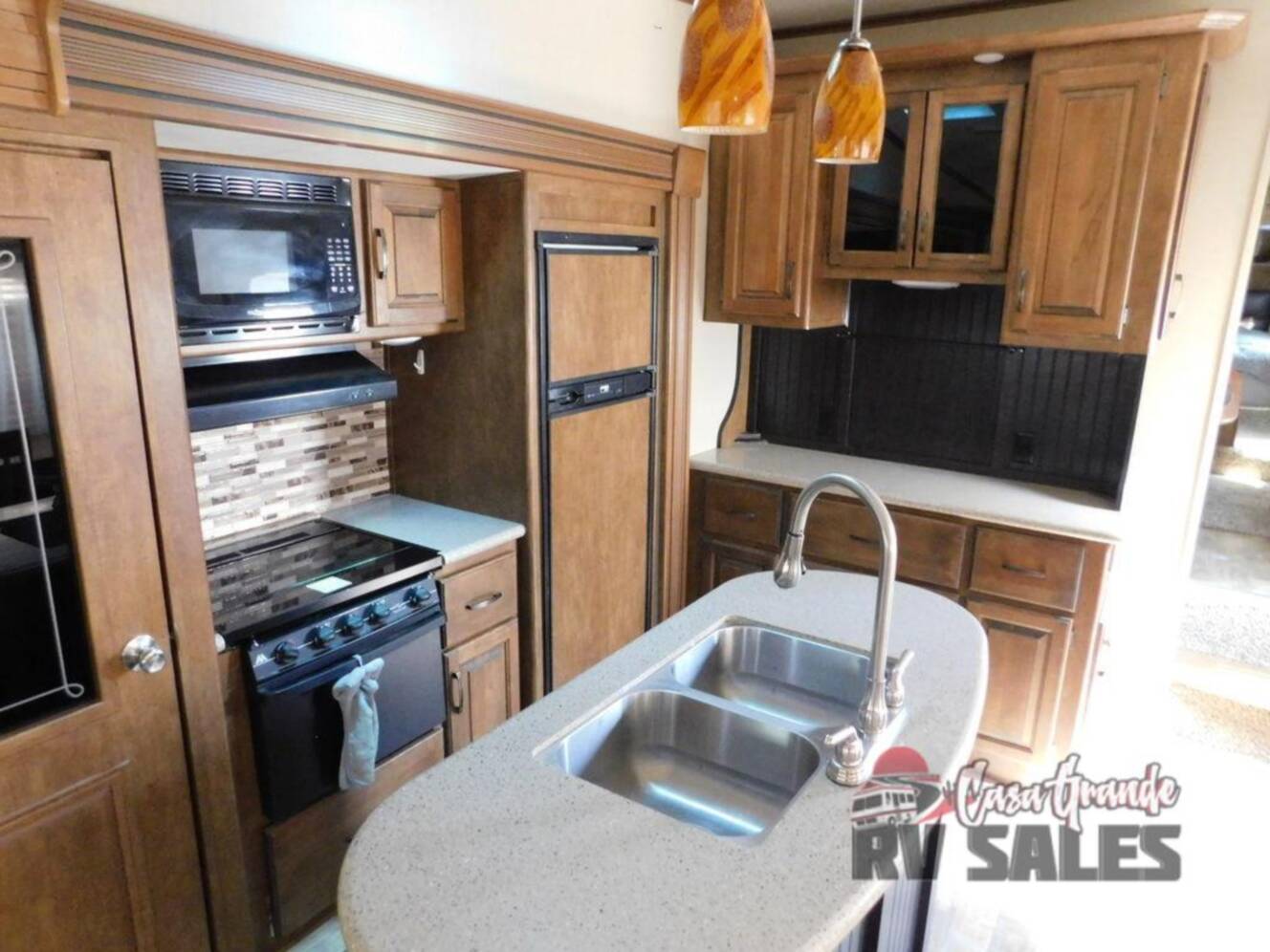 A photo of this 2016 Grand Design Reflection 303RLS