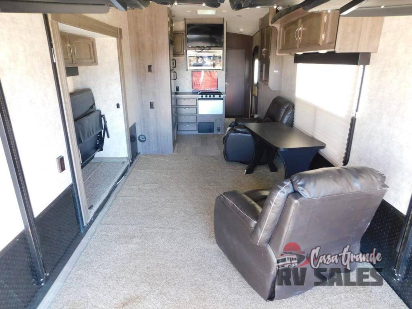 A photo of this 2016 Winnebago Industries Towables Spyder 32SC