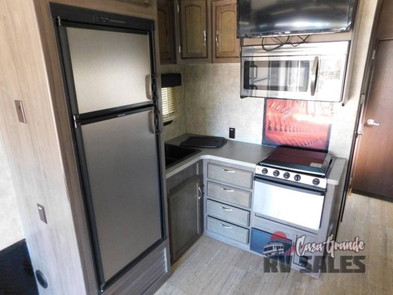 A photo of this 2016 Winnebago Industries Towables Spyder 32SC