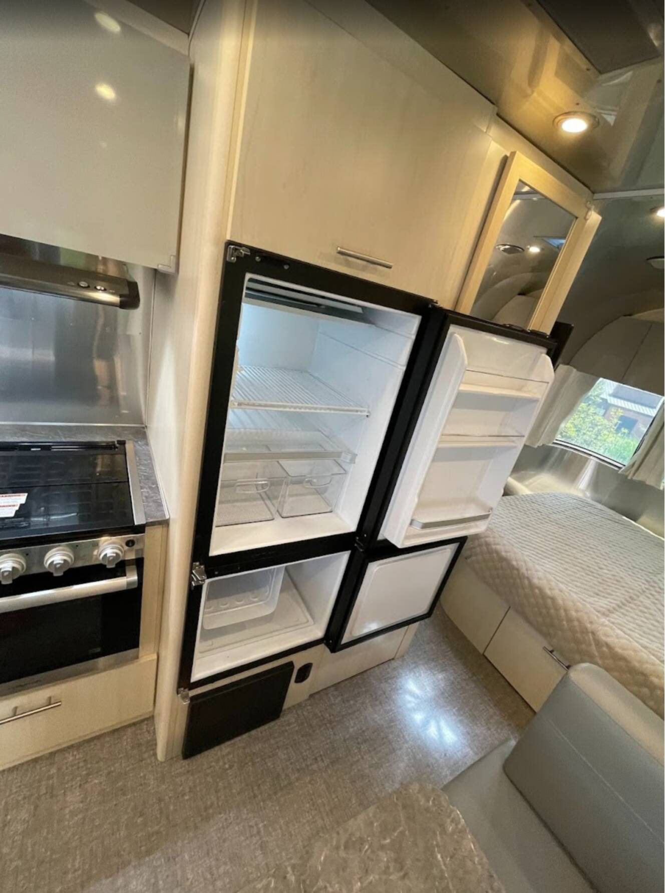 A photo of this 2022 Airstream FLYING CLOUD 23FB QUEEN