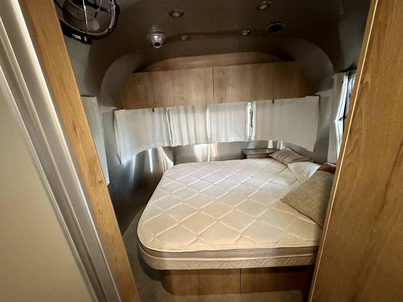A photo of this 2024 Airstream TRADE WIND 25FBQ