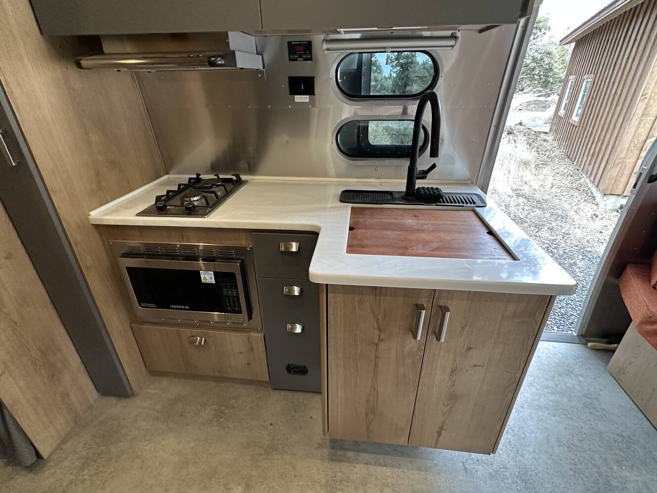 A photo of this 2024 Airstream TRADE WIND 25FBQ