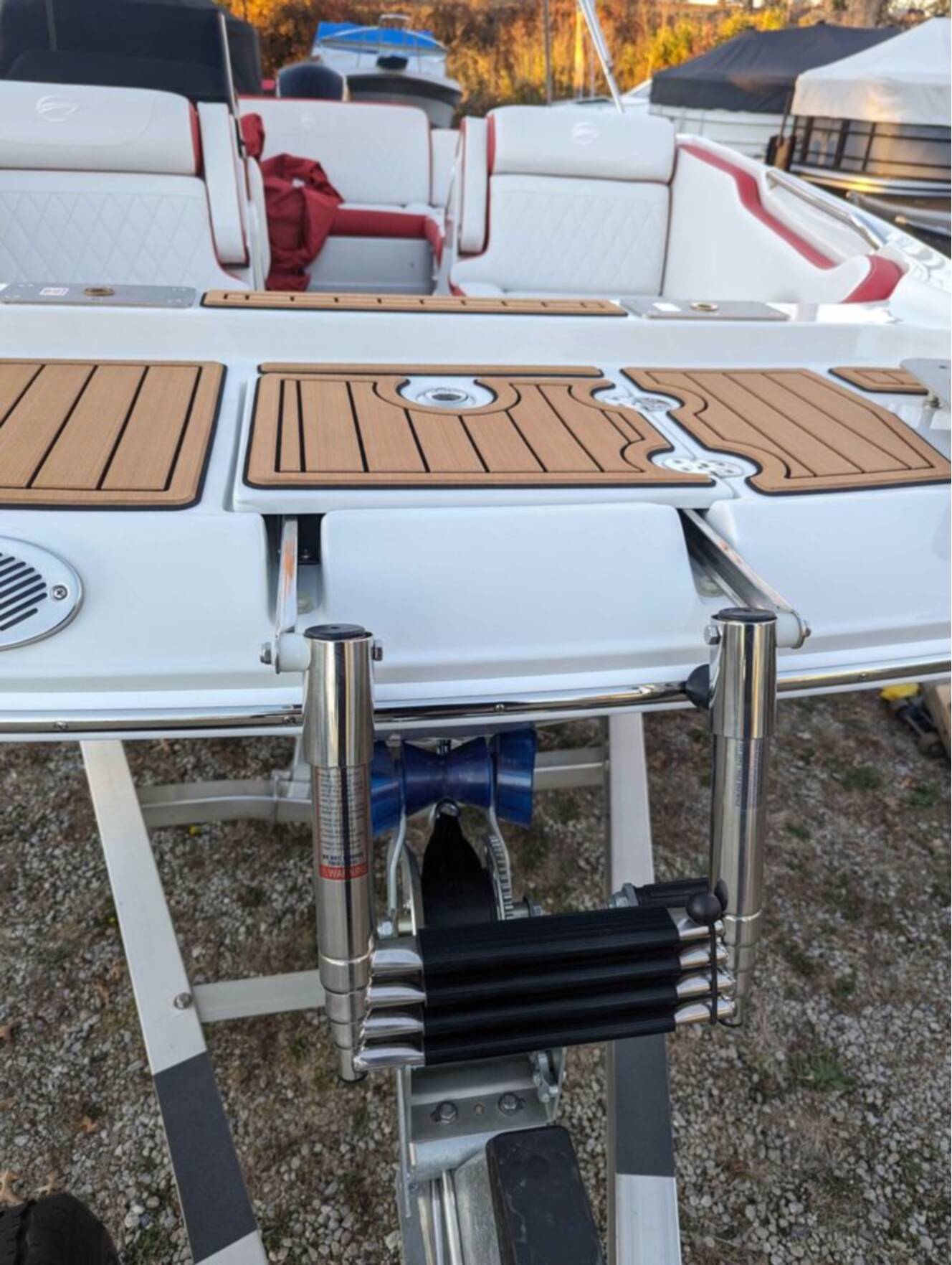 A photo of this 2025 Crownline E210 XS w/ 150 HP Mercury Outboard & Matching Trailer