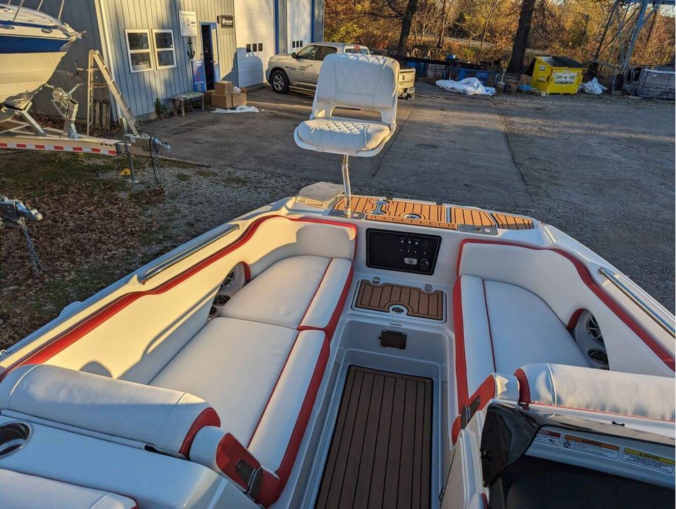 A photo of this 2025 Crownline E210 XS w/ 150 HP Mercury Outboard & Matching Trailer
