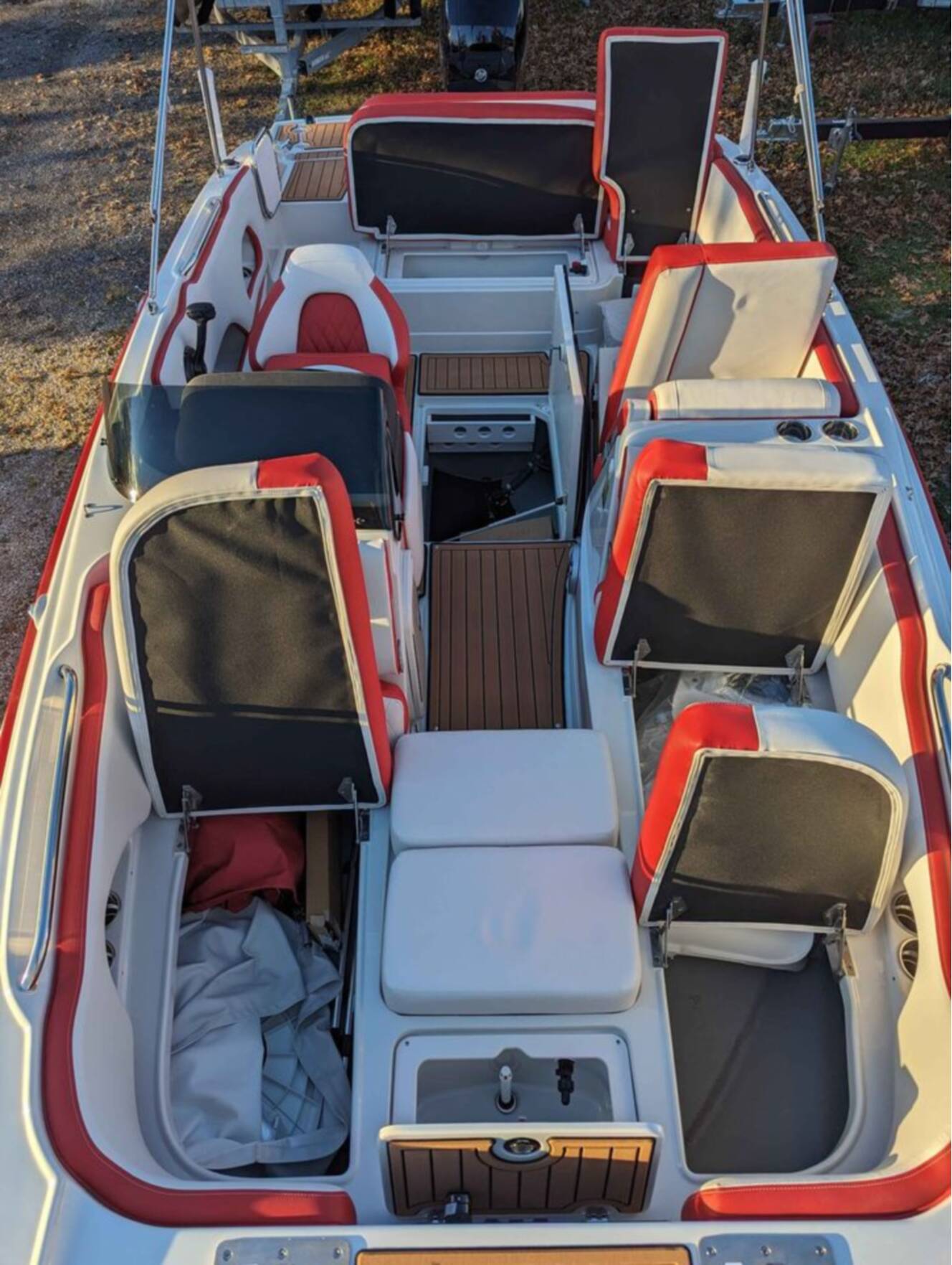 A photo of this 2025 Crownline E210 XS w/ 150 HP Mercury Outboard & Matching Trailer