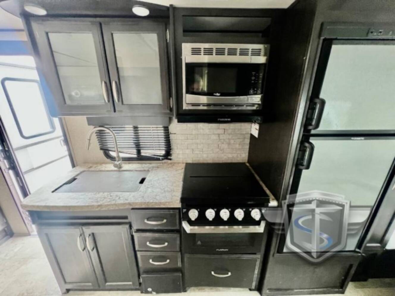 A photo of this 2019 Grand Design Imagine XLS 19RLE