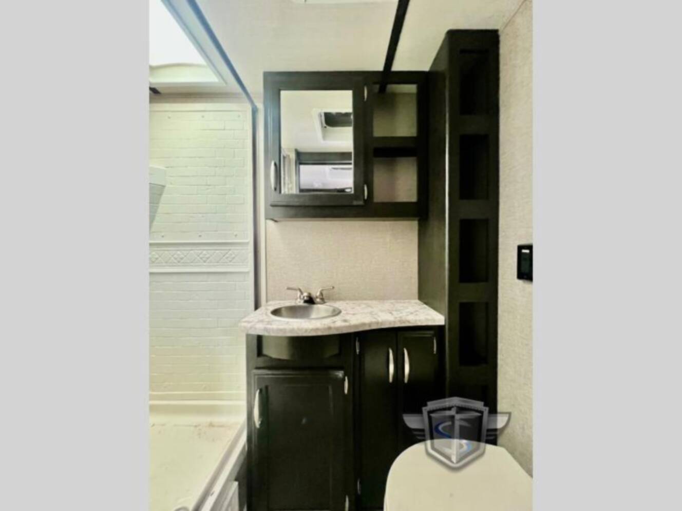 A photo of this 2019 Grand Design Imagine XLS 19RLE