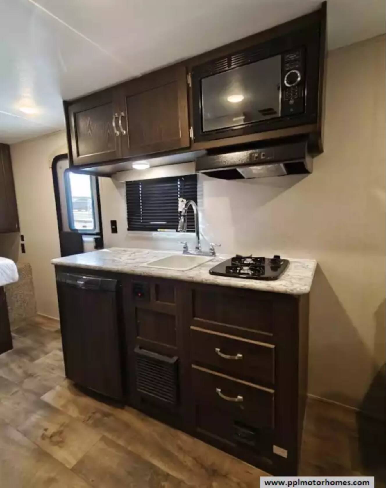 A photo of this 2020 Keystone Springdale 1750RD