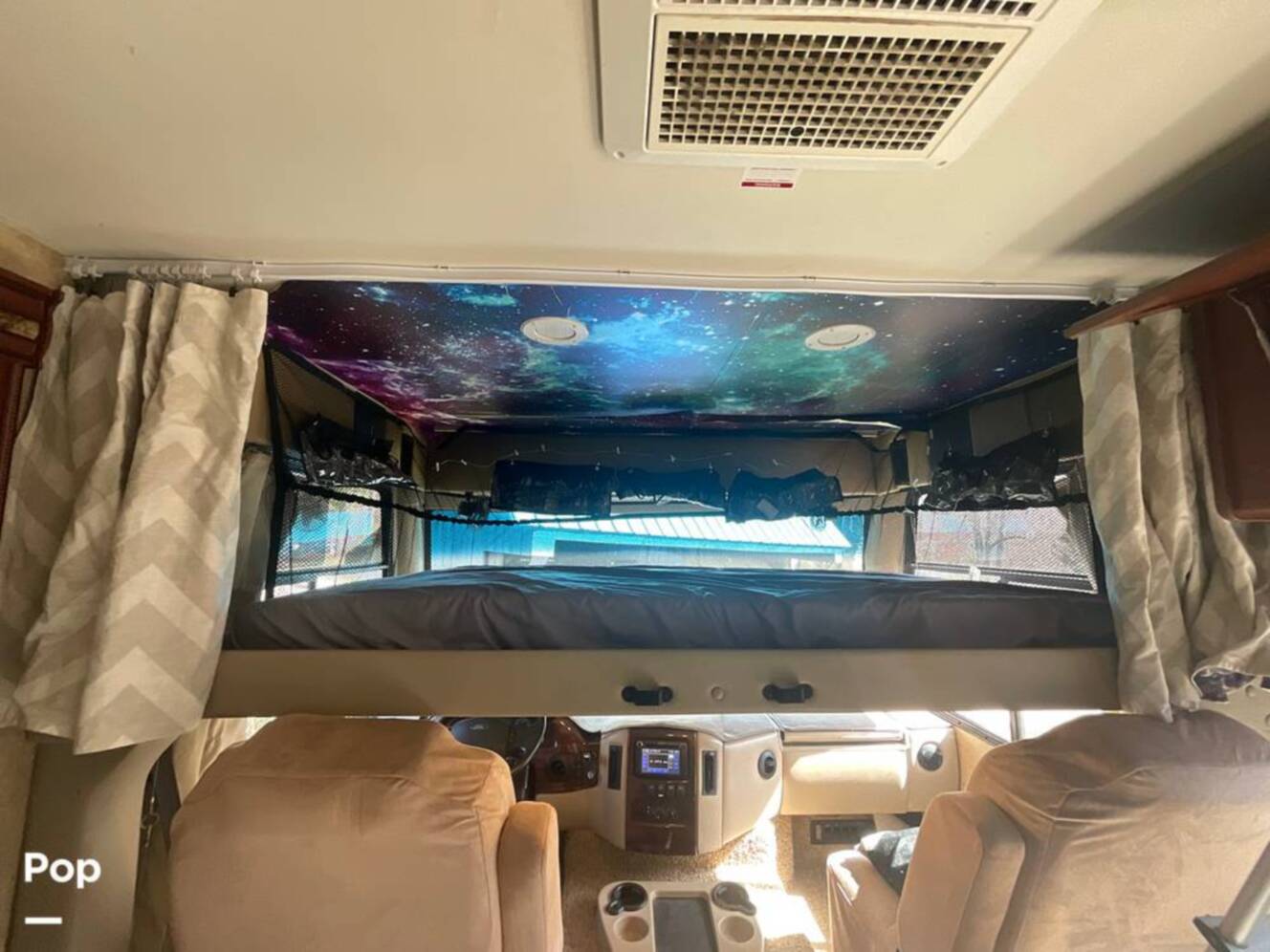 A photo of this 2014 Thor Motor Coach Hurricane 34J