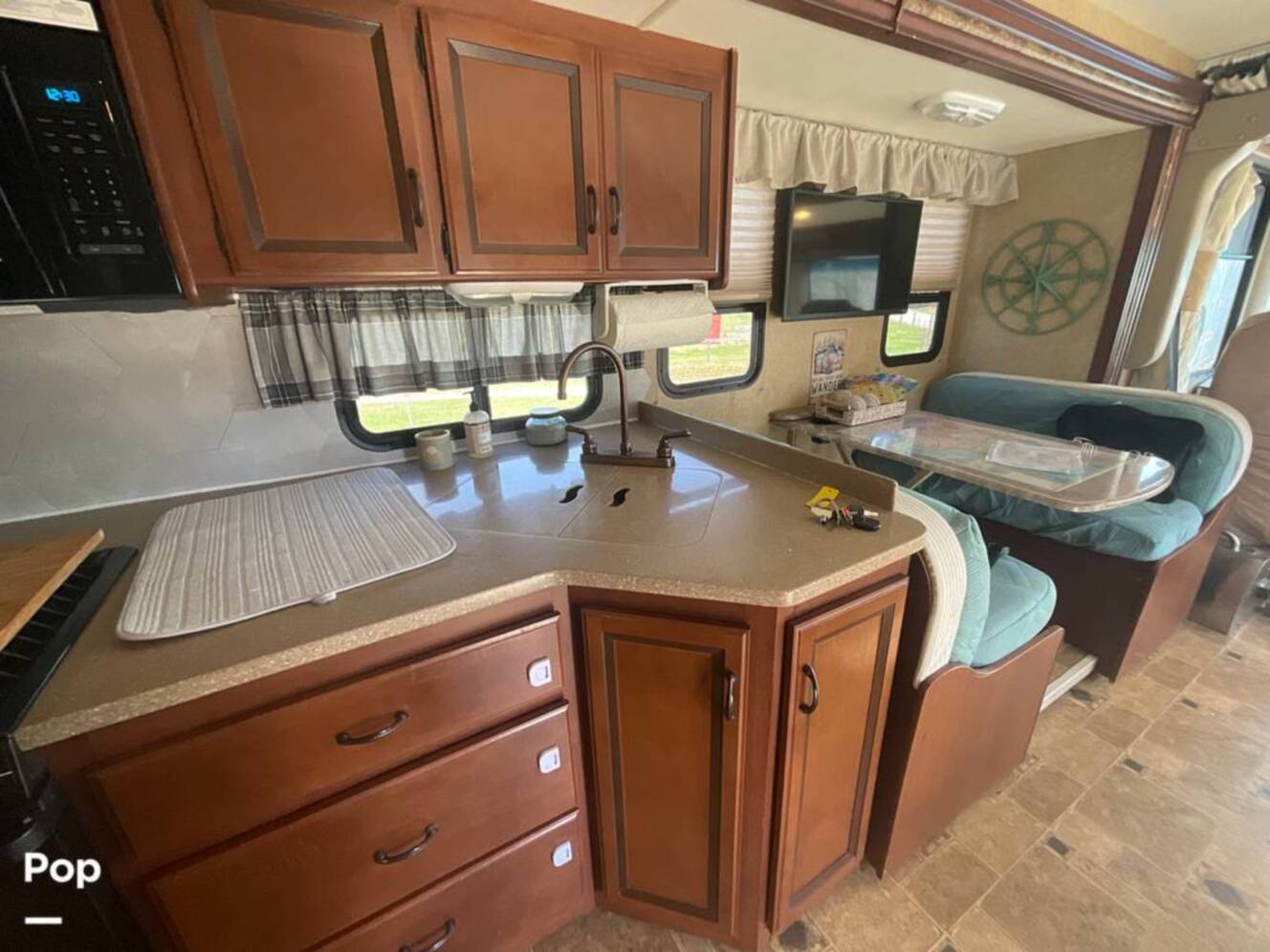 A photo of this 2014 Thor Motor Coach Hurricane 34J