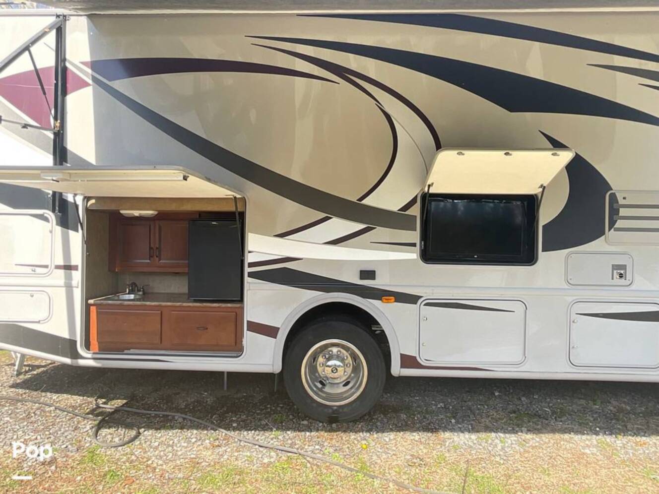 A photo of this 2014 Thor Motor Coach Hurricane 34J