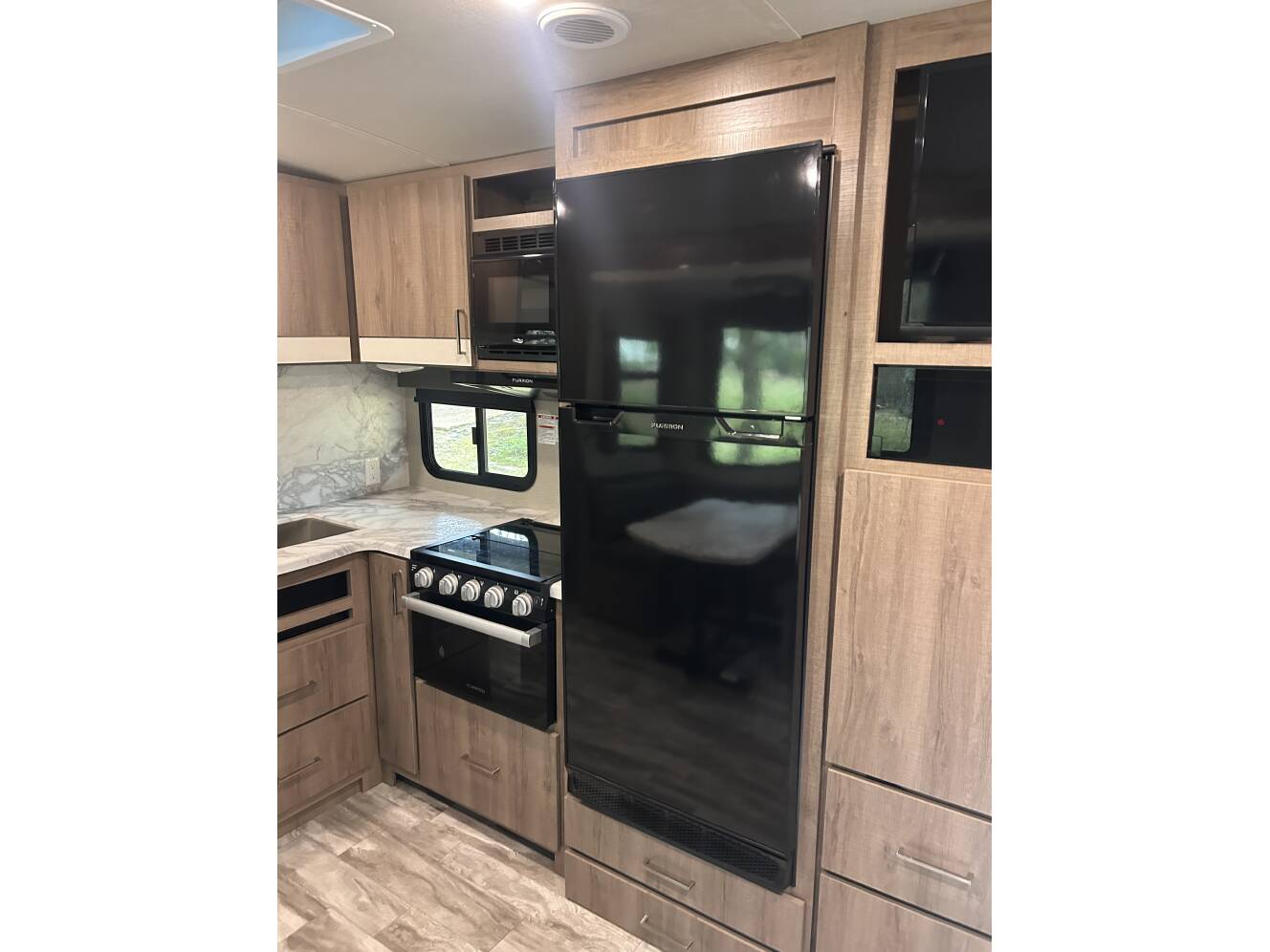 A photo of this 2022 Grand Design IMAGINE 2910BH