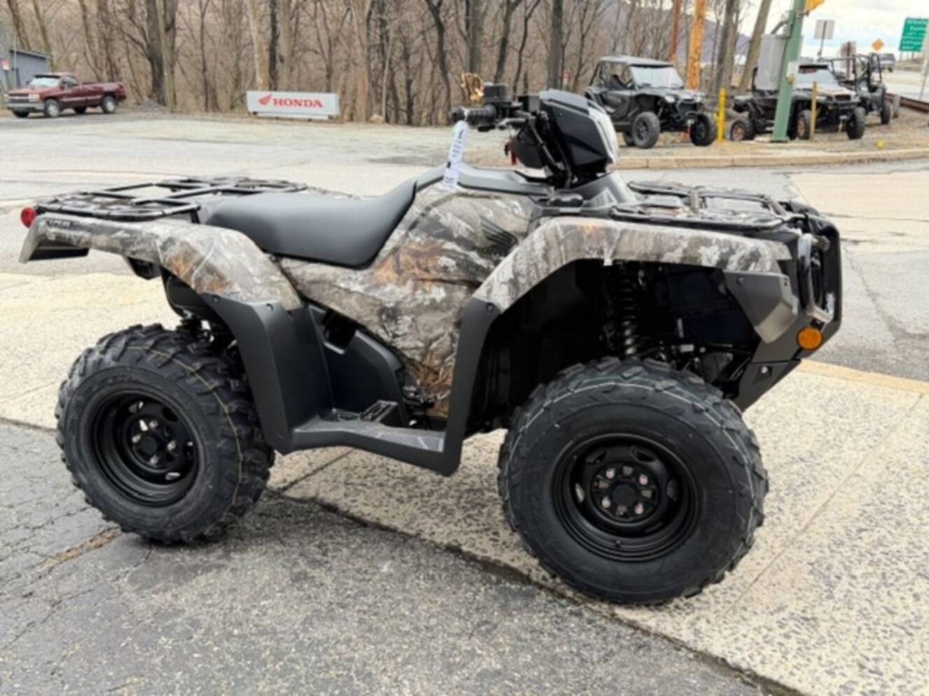 A photo of this 2026 Honda® FourTrax Foreman Rubicon 4x4 Automatic DCT EPS TrueTimb