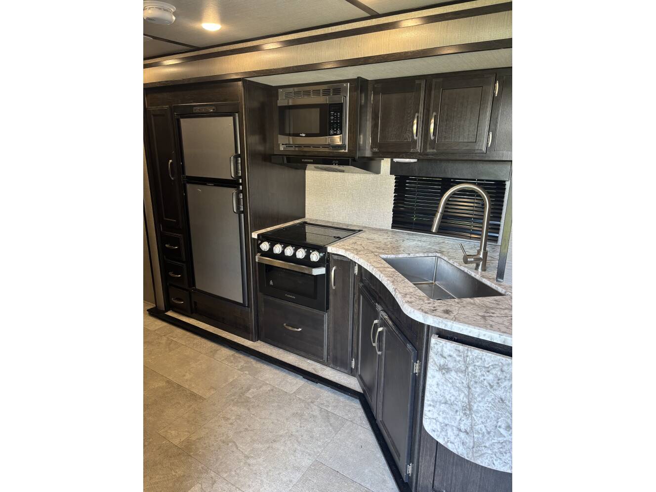 A photo of this 2019 Grand Design IMAGINE XLS 19BWE