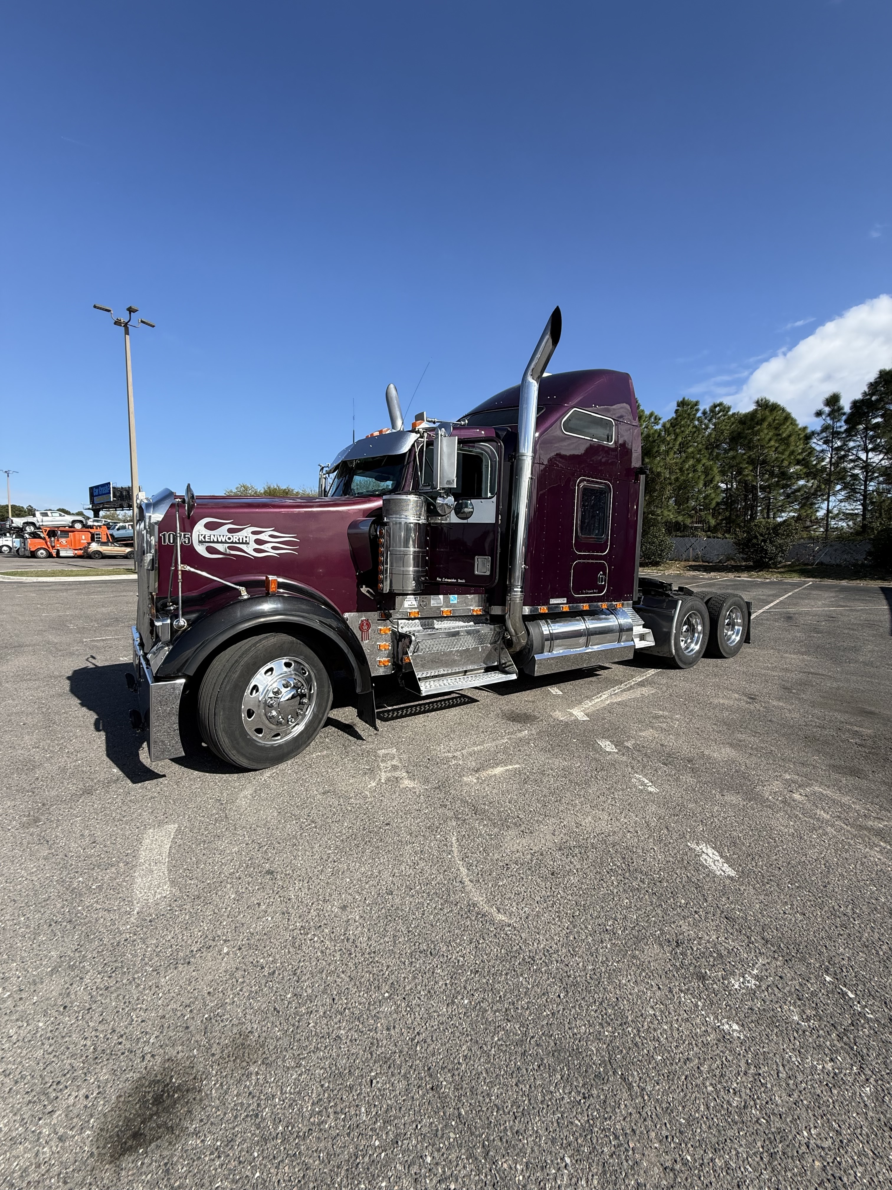 Modellino Kenworth W900L 1/64 – First Gear – Rosso/Grigio Con Rimorchio A Fondo Tondo