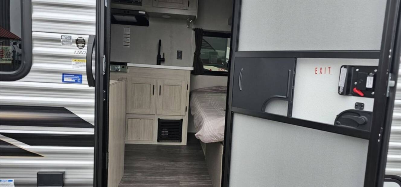 A photo of this 2026 Forest River Rv Aurora Light 13RDX
