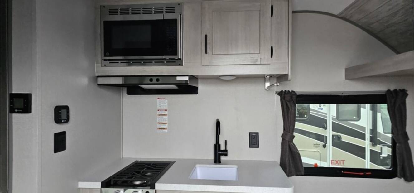 A photo of this 2026 Forest River Rv Aurora Light 13RDX