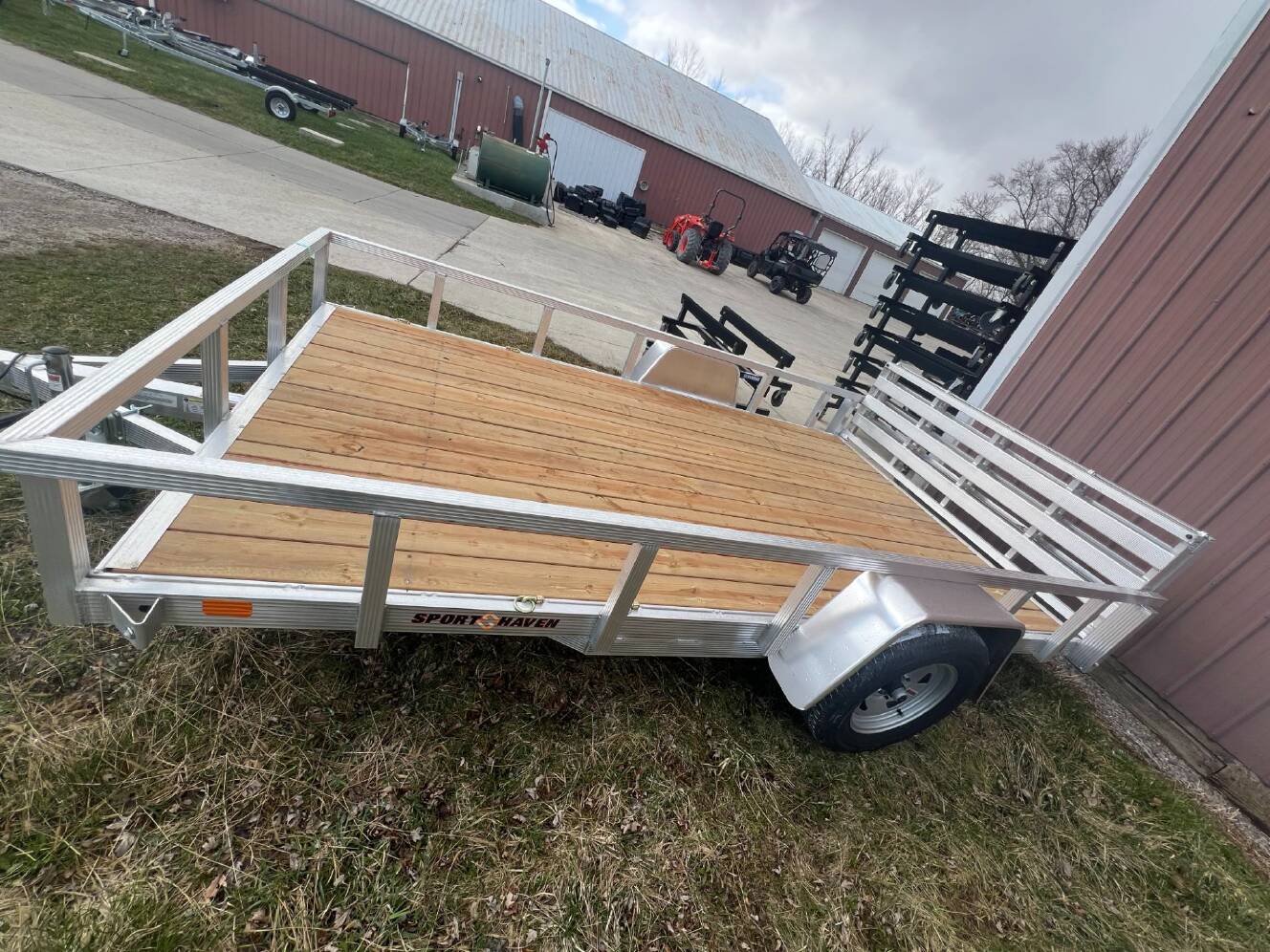 A photo of this 2026 Sporthaven Trailers Aluminum 7x12 w/folding ramp