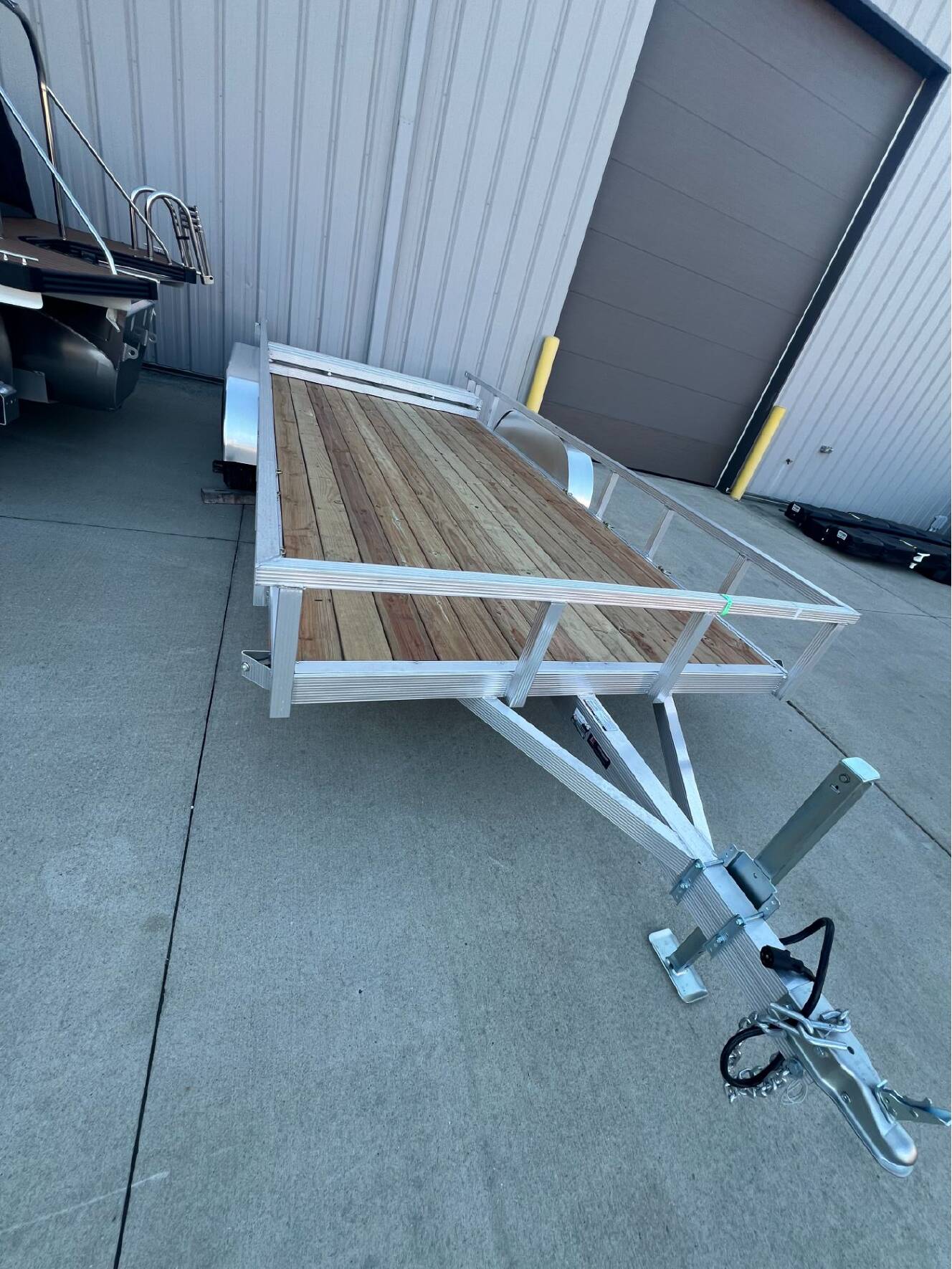 A photo of this 2016 Sporthaven Trailers Utility 7x16 Tandem w/ Folding Ramp