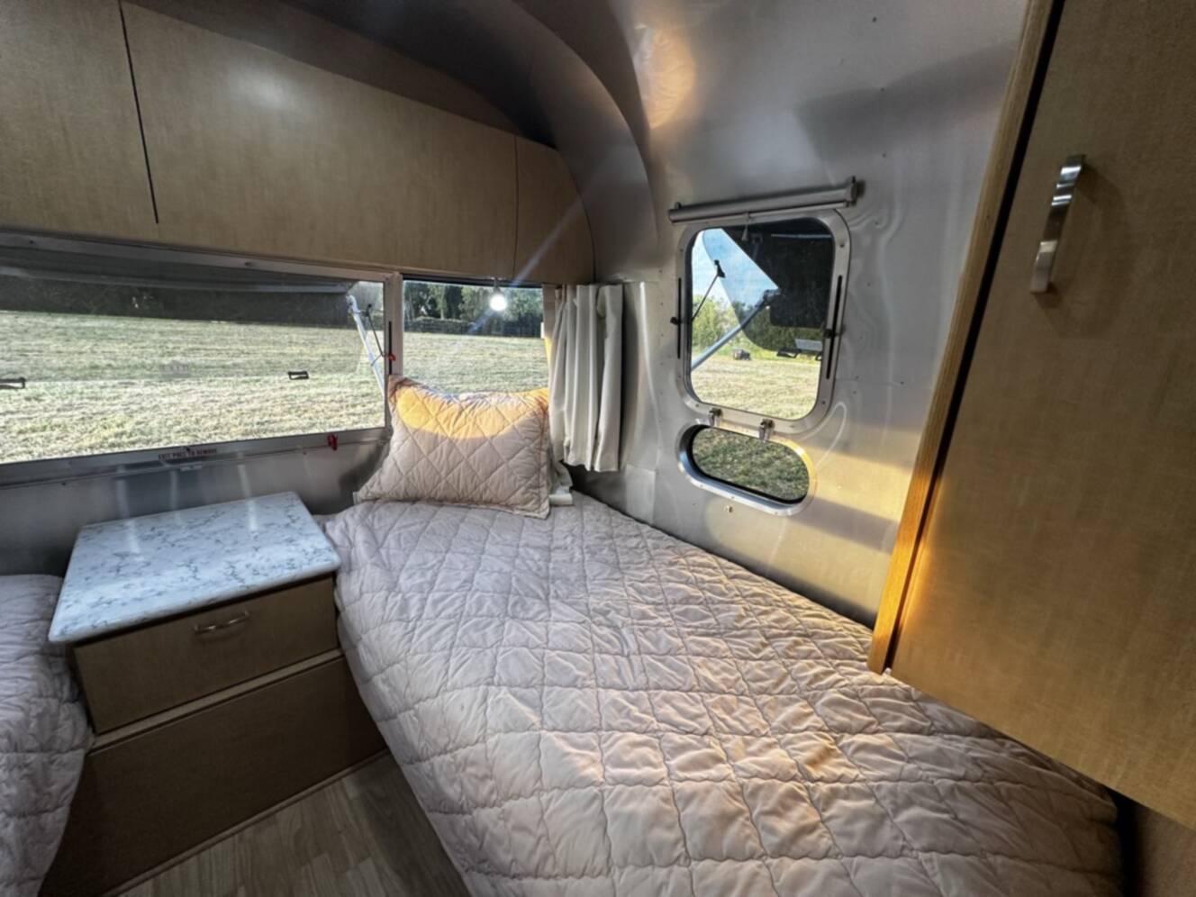 A photo of this 2017 Airstream FLYING CLOUD 25RB TWIN