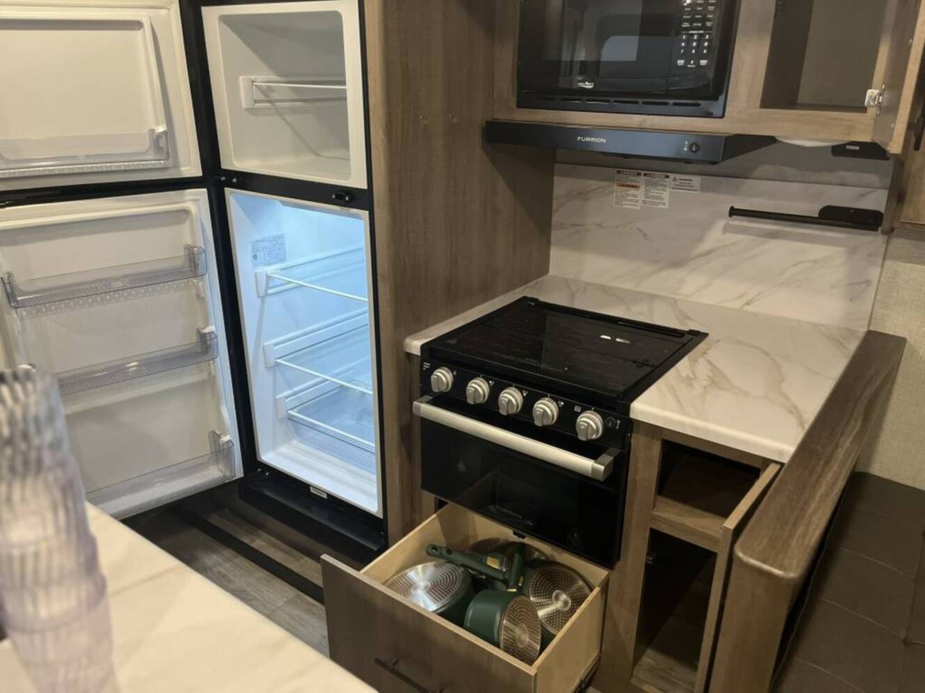 A photo of this 2023 Grand Design IMAGINE 3210BH