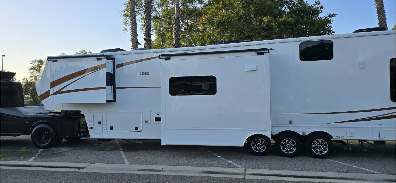A photo of this 2023 Luxe TOY HAULER 48FB