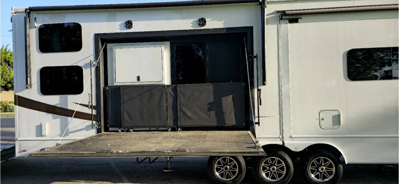 A photo of this 2023 Luxe TOY HAULER 48FB