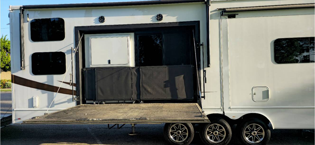 A photo of this 2023 Luxe TOY HAULER 48FB