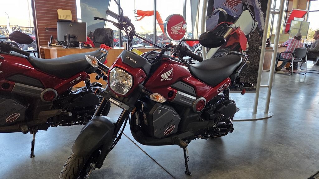 2026 Honda® Navi Pearl Red BASE in Batesville, AR