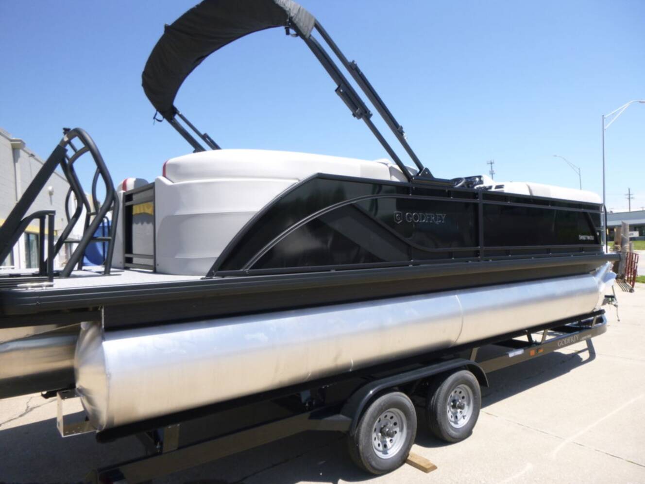 A photo of this 2026 Godfrey Pontoons Sweetwater 2286SB 27" IMPACT Center Tube Package