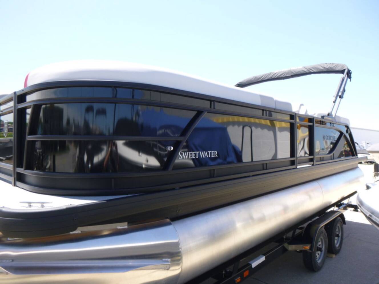 A photo of this 2026 Godfrey Pontoons Sweetwater 2286SB 27" IMPACT Center Tube Package