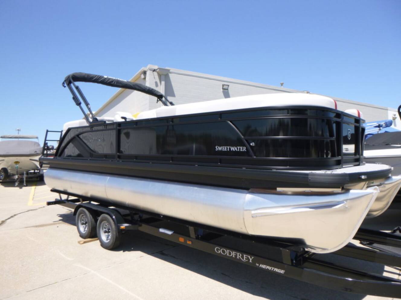 A photo of this 2026 Godfrey Pontoons Sweetwater 2286SB 27" IMPACT Center Tube Package