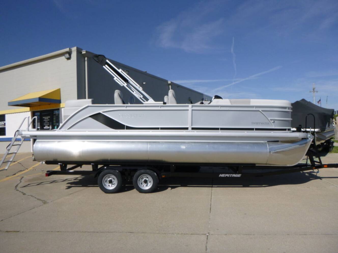 A photo of this 2026 Godfrey Pontoons Sweetwater 2286 QS Sport Tube 27 in. Package