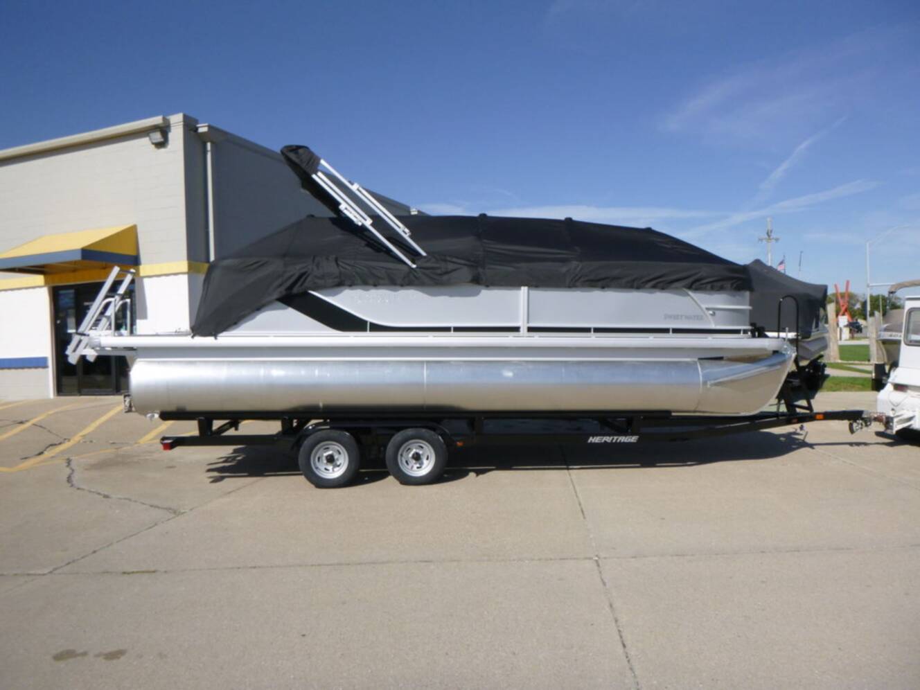 A photo of this 2026 Godfrey Pontoons Sweetwater 2286 QS Sport Tube 27 in. Package
