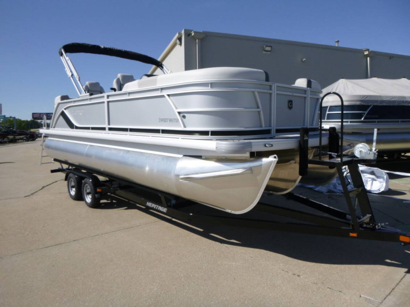 A photo of this 2026 Godfrey Pontoons Sweetwater 2286 QS Sport Tube 27 in. Package