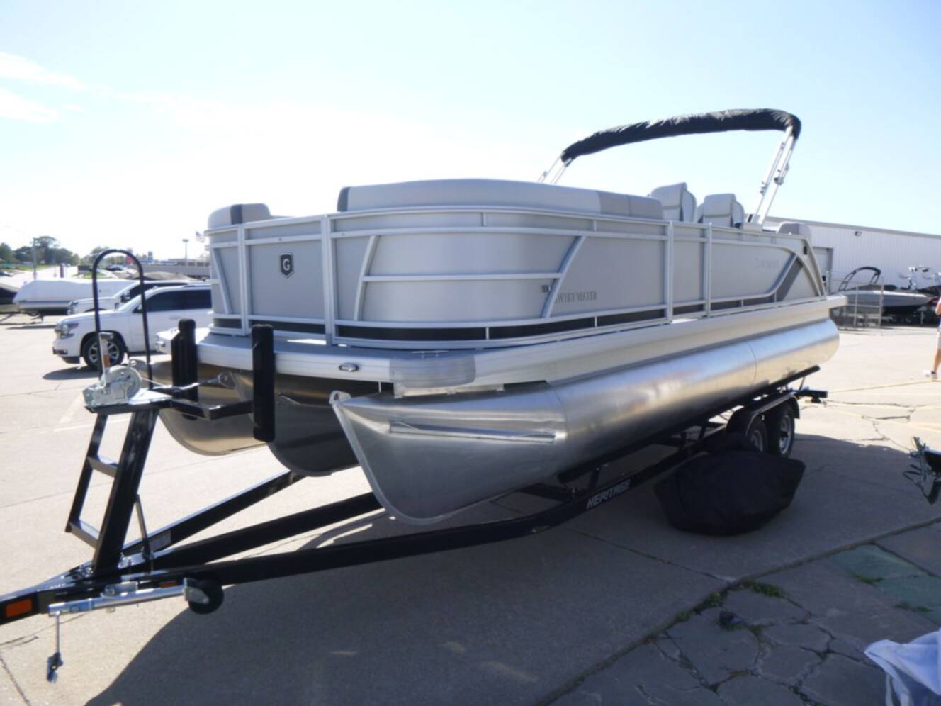 A photo of this 2026 Godfrey Pontoons Sweetwater 2286 QS Sport Tube 27 in. Package