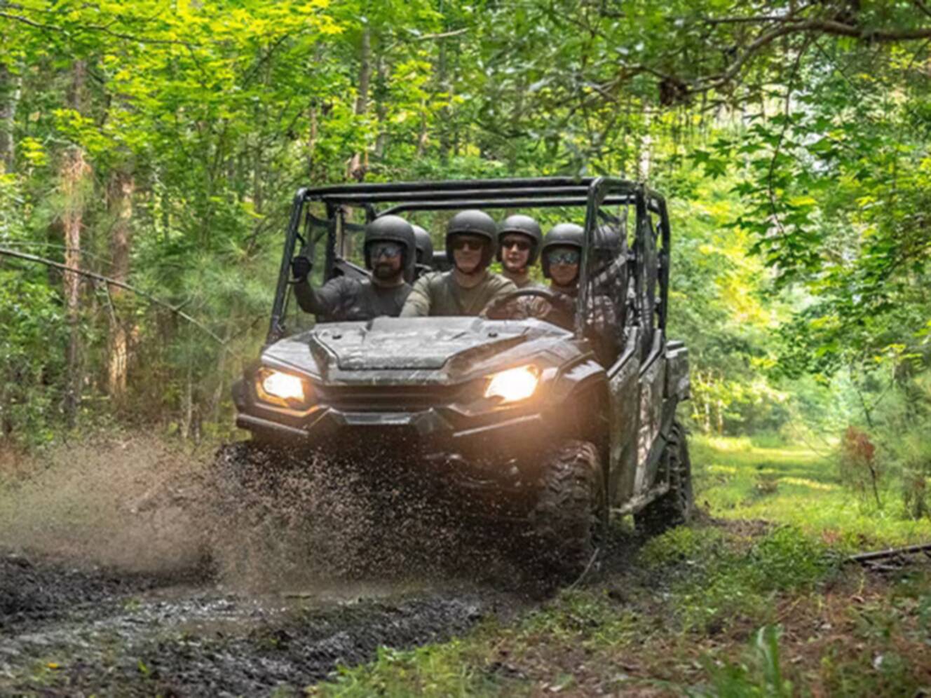 A photo of this 2025 Honda Pioneer 1000-6 Deluxe Crew