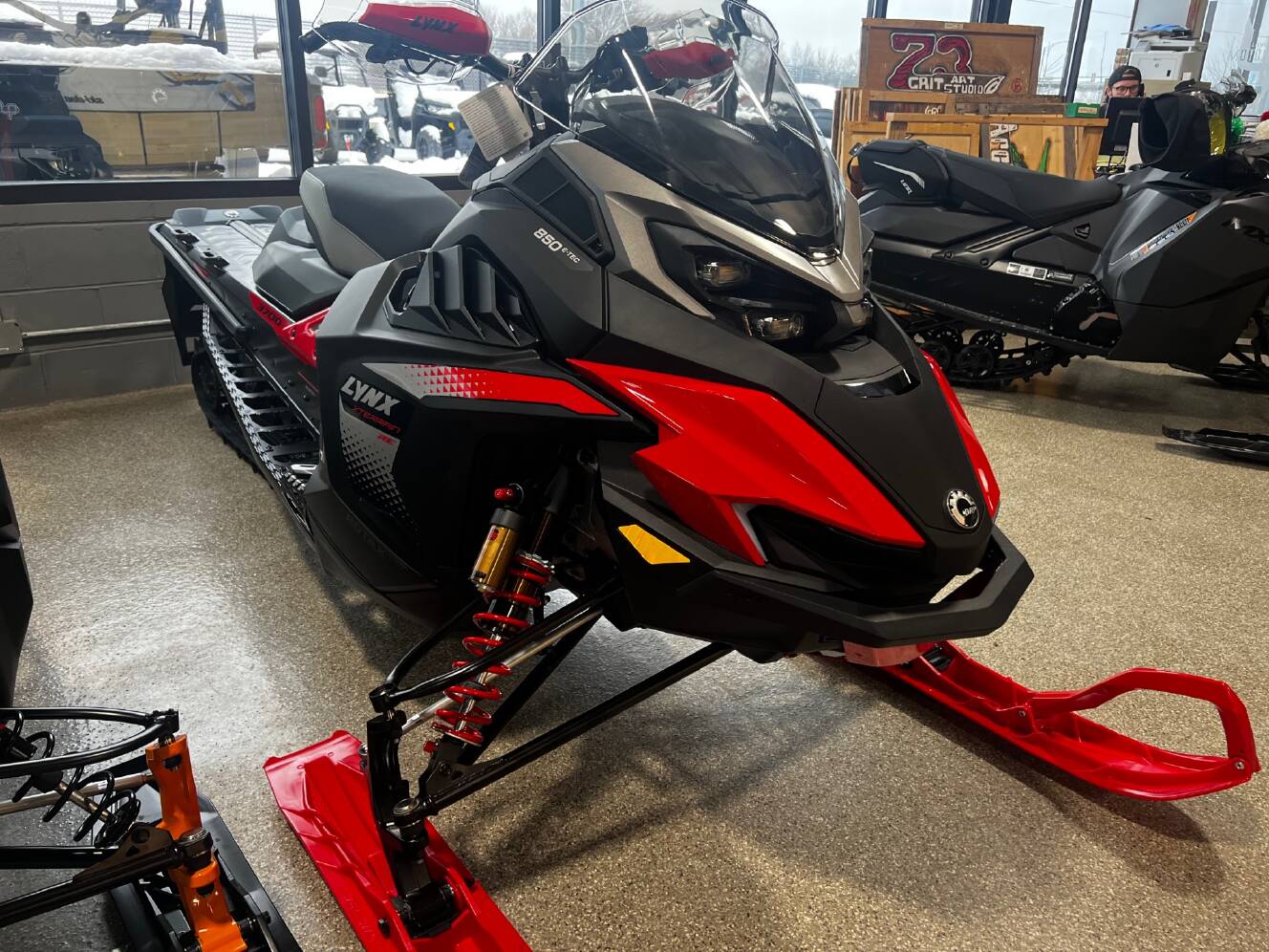 A photo of this 2026 Lynx Xterrain RE 850 E-TEC PowderMax 2.0 M.S. / E.S. w/ 10.