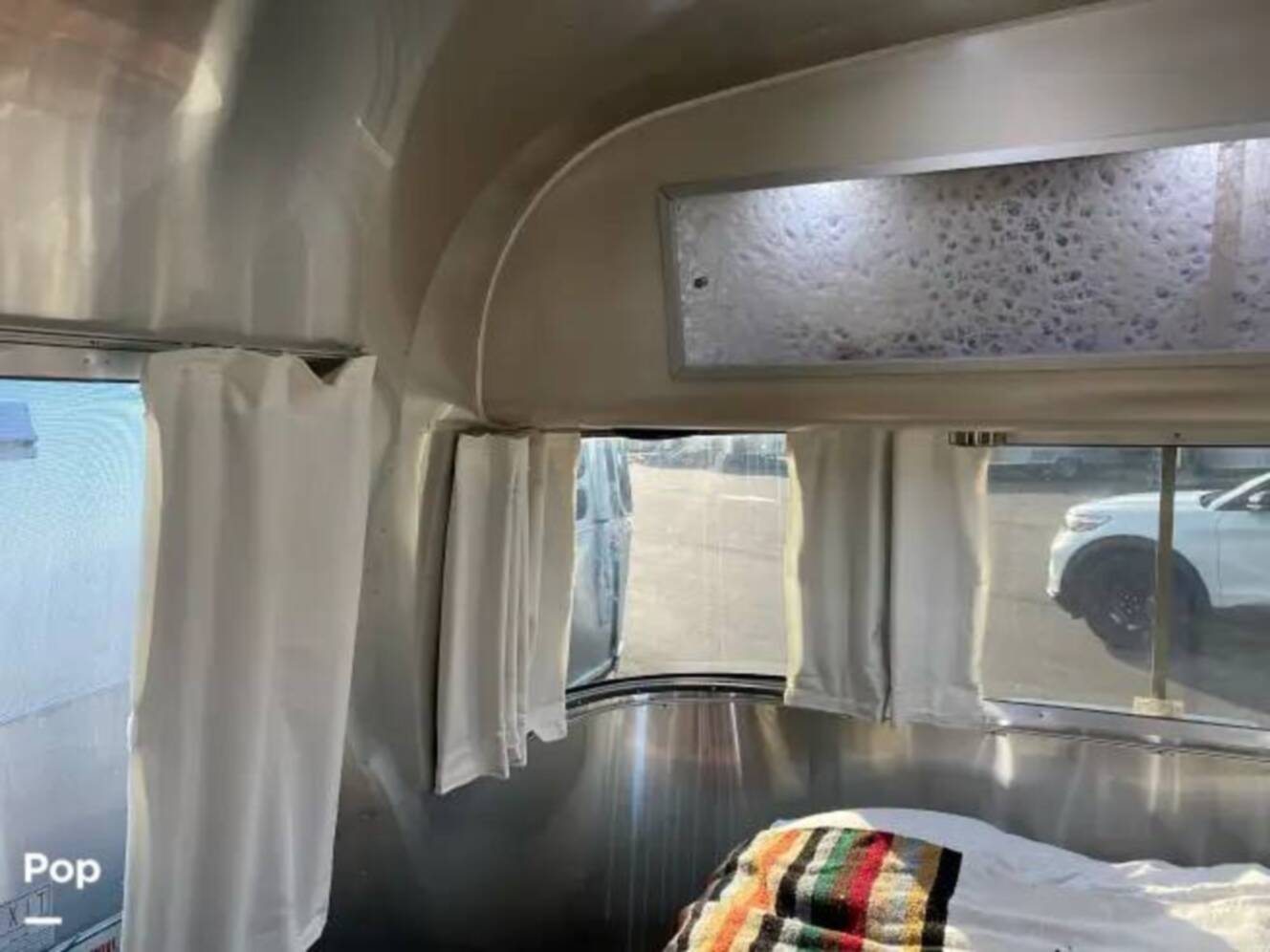 A photo of this 2018 Airstream International Serenity 25FB Queen