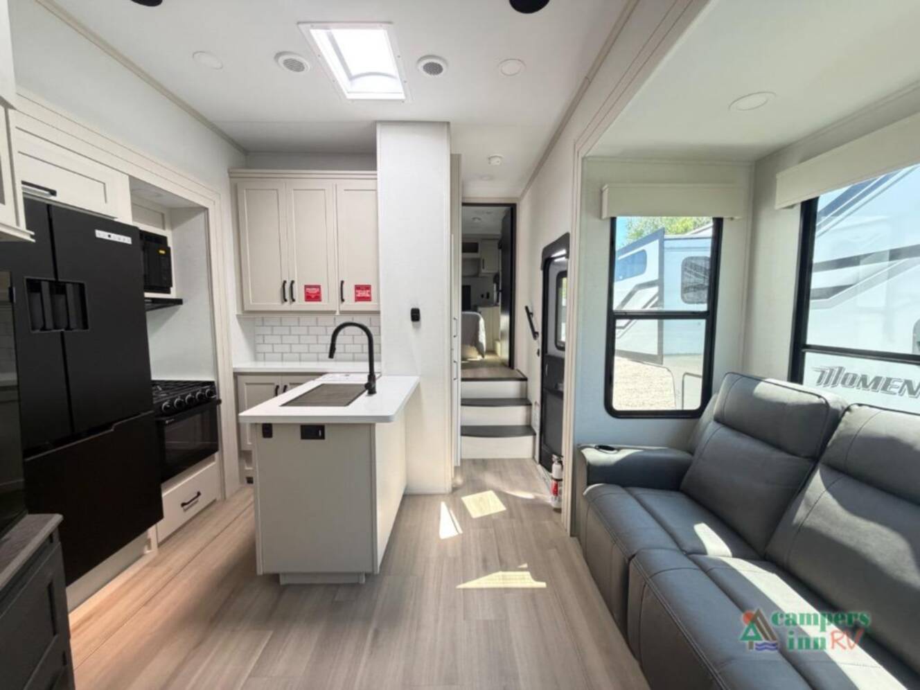 A photo of this 2026 Grand Design Momentum G-Class 320G