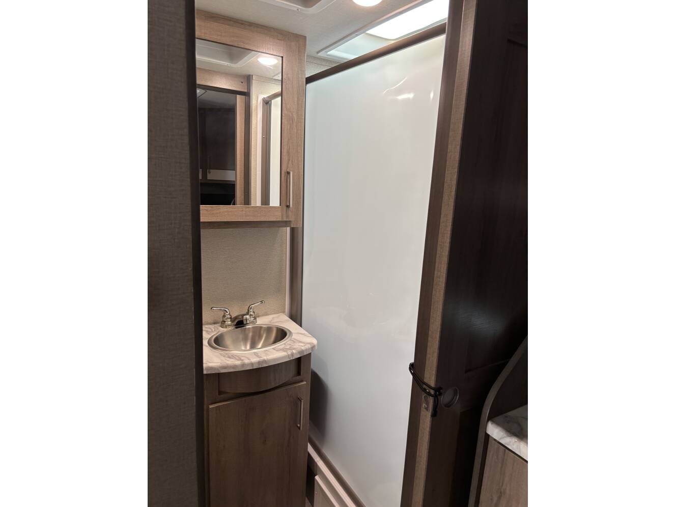 A photo of this 2022 Grand Design IMAGINE XLS 22MLE